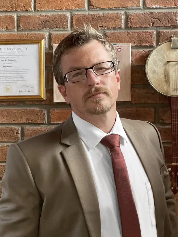 Dr. Adam B. Tredwell